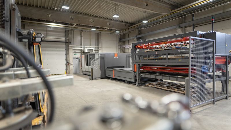 Industrial manufacturing facility with large machinery and equipment.